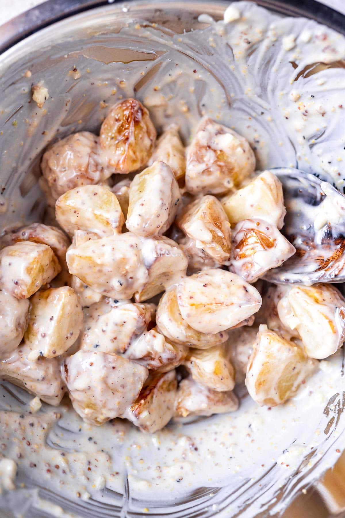 Roasted potatoes tossed in a creamy white dressing.