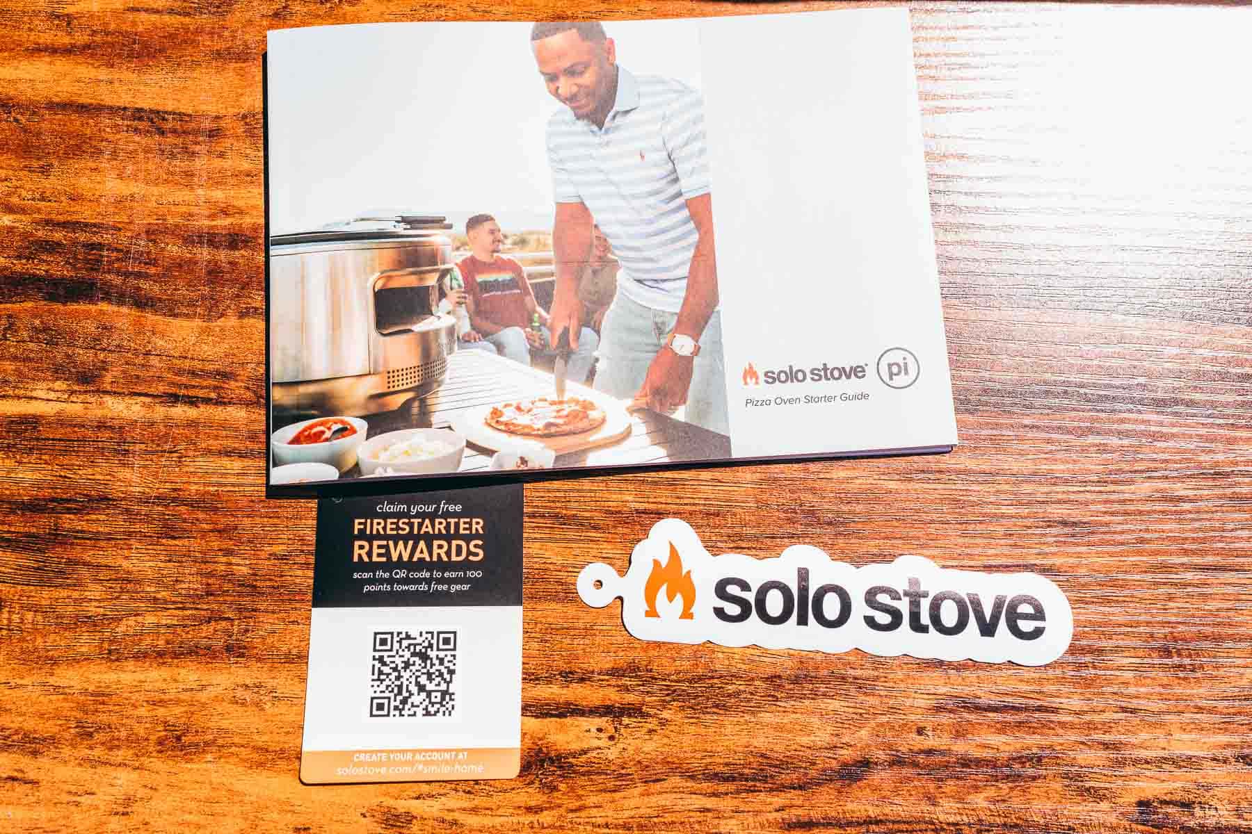 Qr code for the Solo Stove pizza oven on a wooden table.