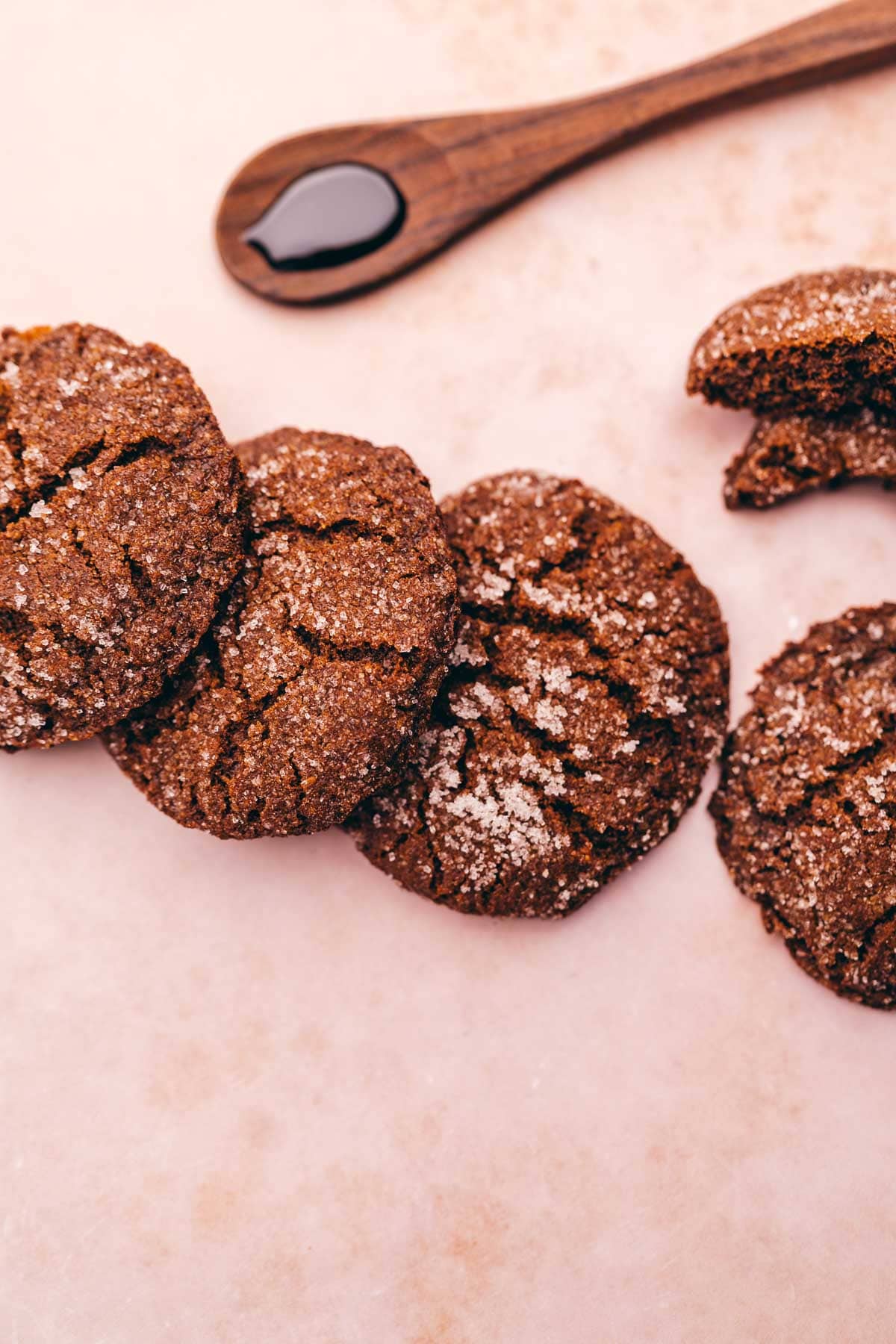 A group of gluten-free ginger molasses cookies on a table.