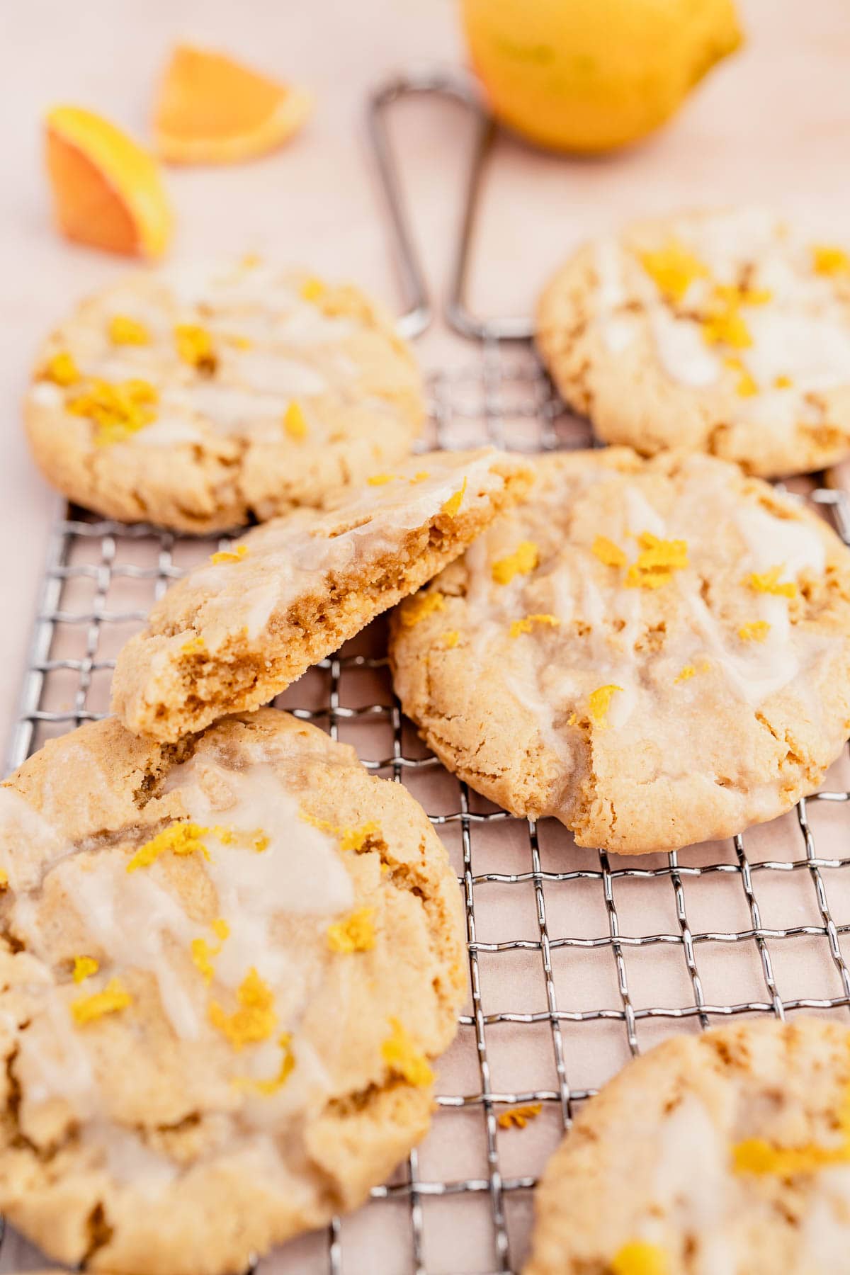 Gluten-free lemon glazed cookies on a cooling rack.