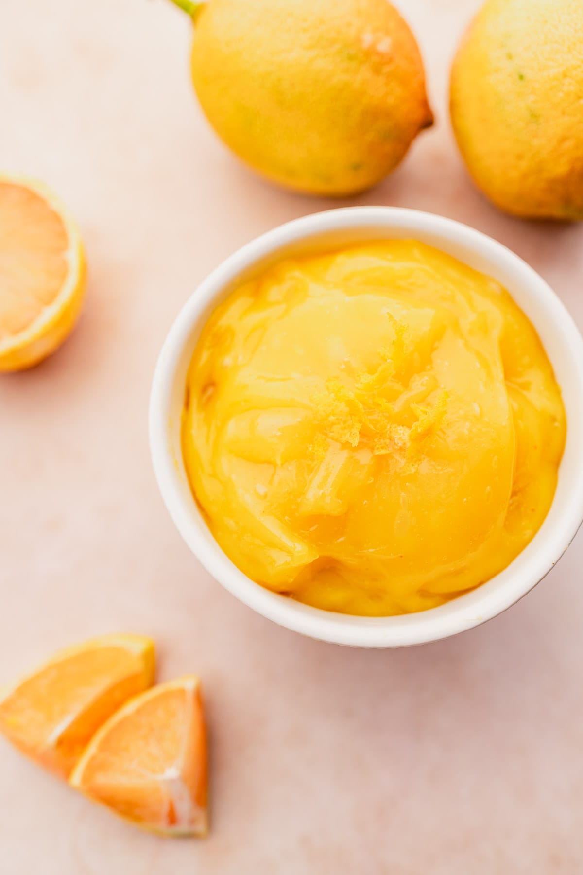A vegan bowl of orange marmalade.