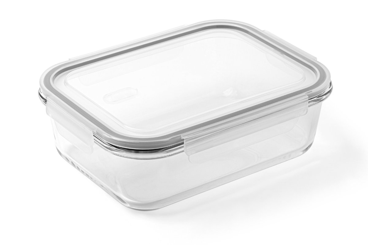 A clear glass container with a lid on a white background.