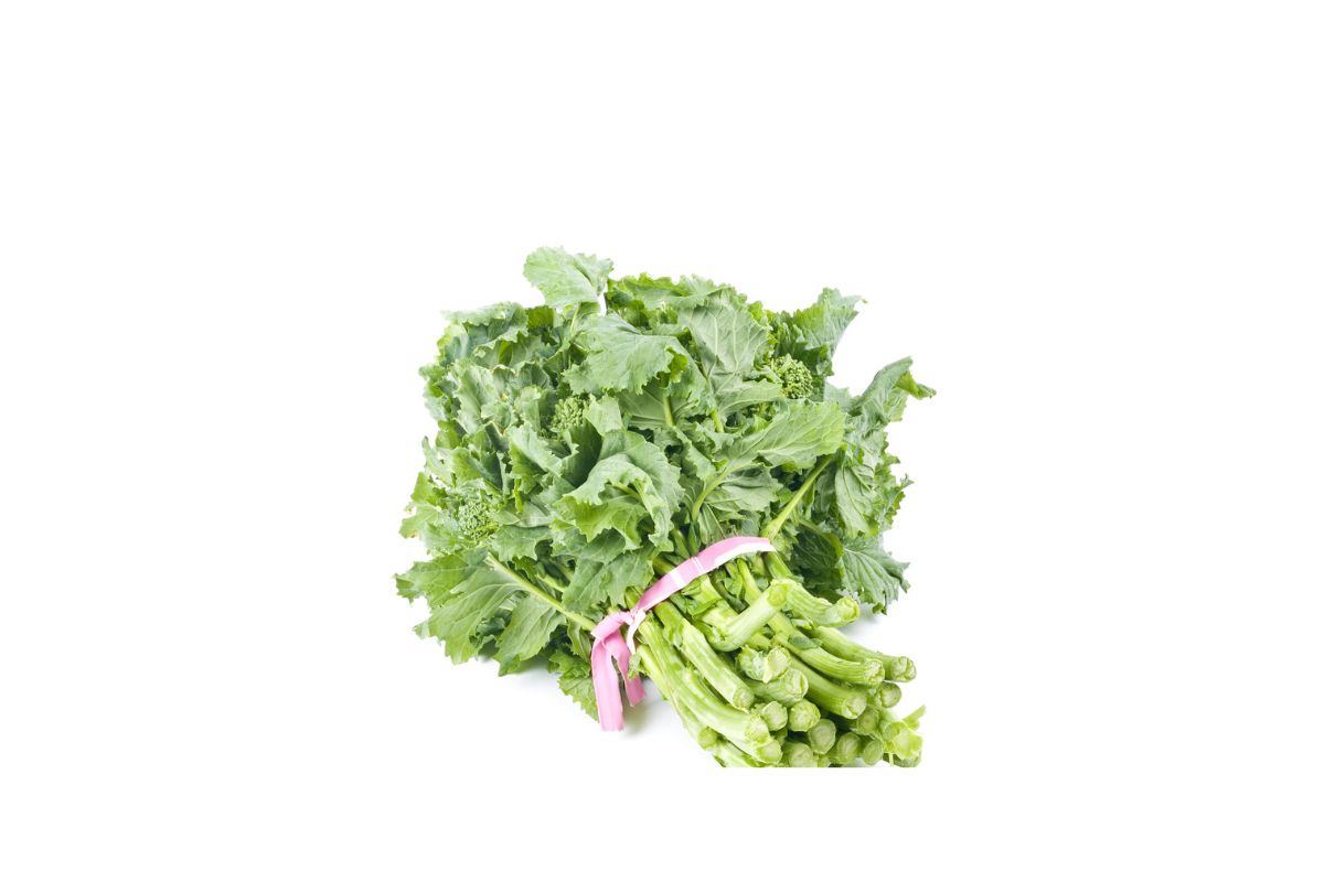 A bunch of green vegetables on a white background.