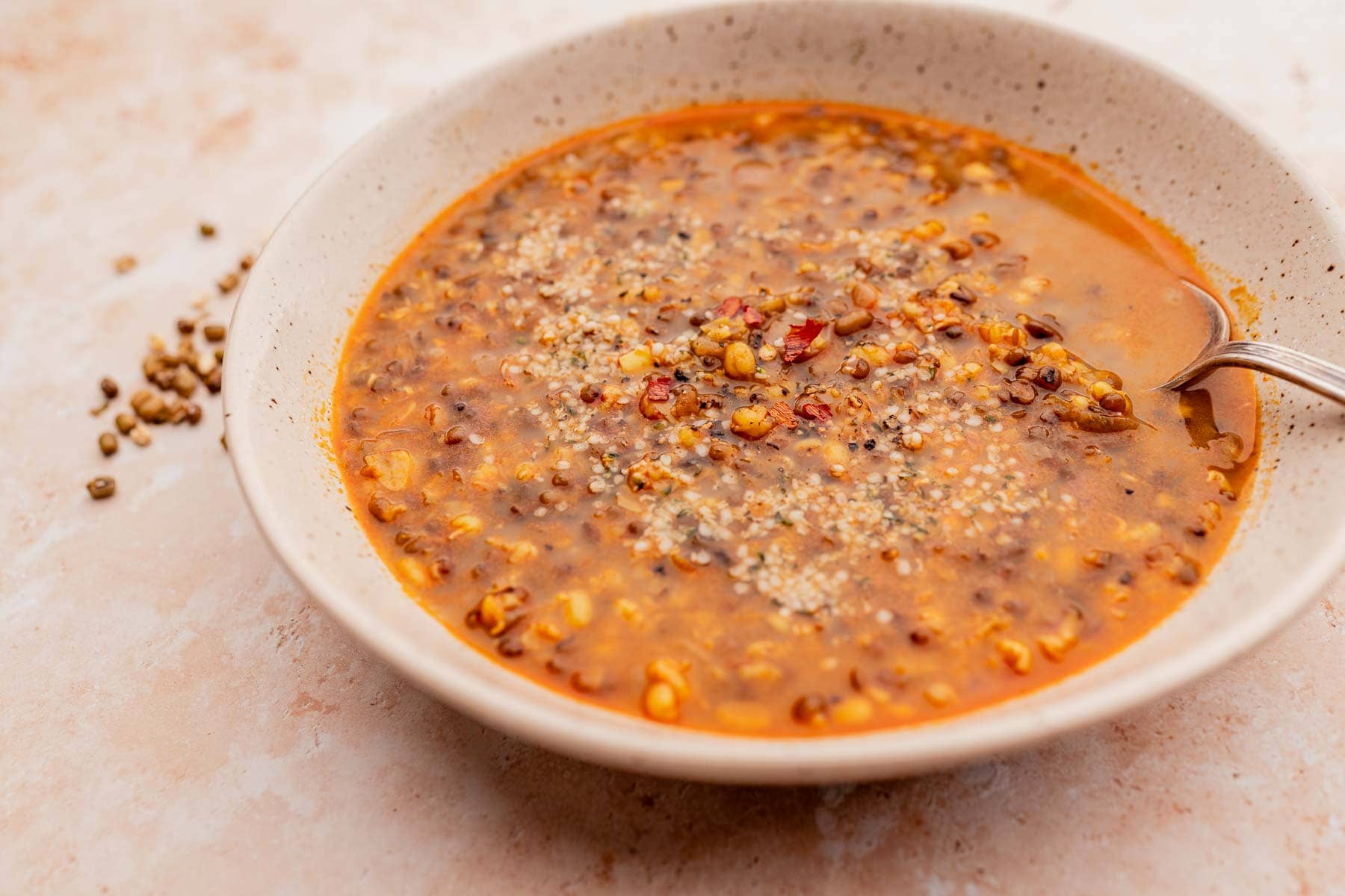 A small ceramic bowl filled with mung bean soup.