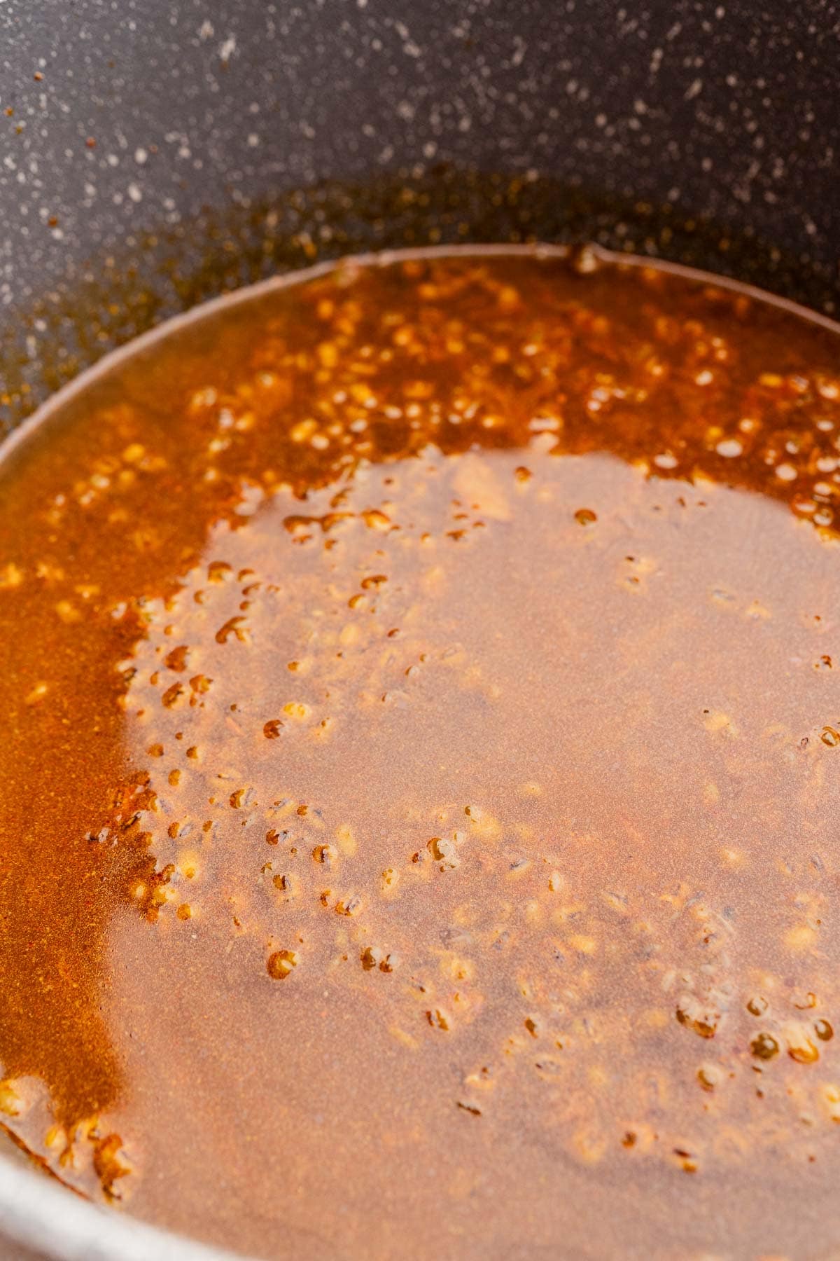 A large pot with mung bean soup simmering.