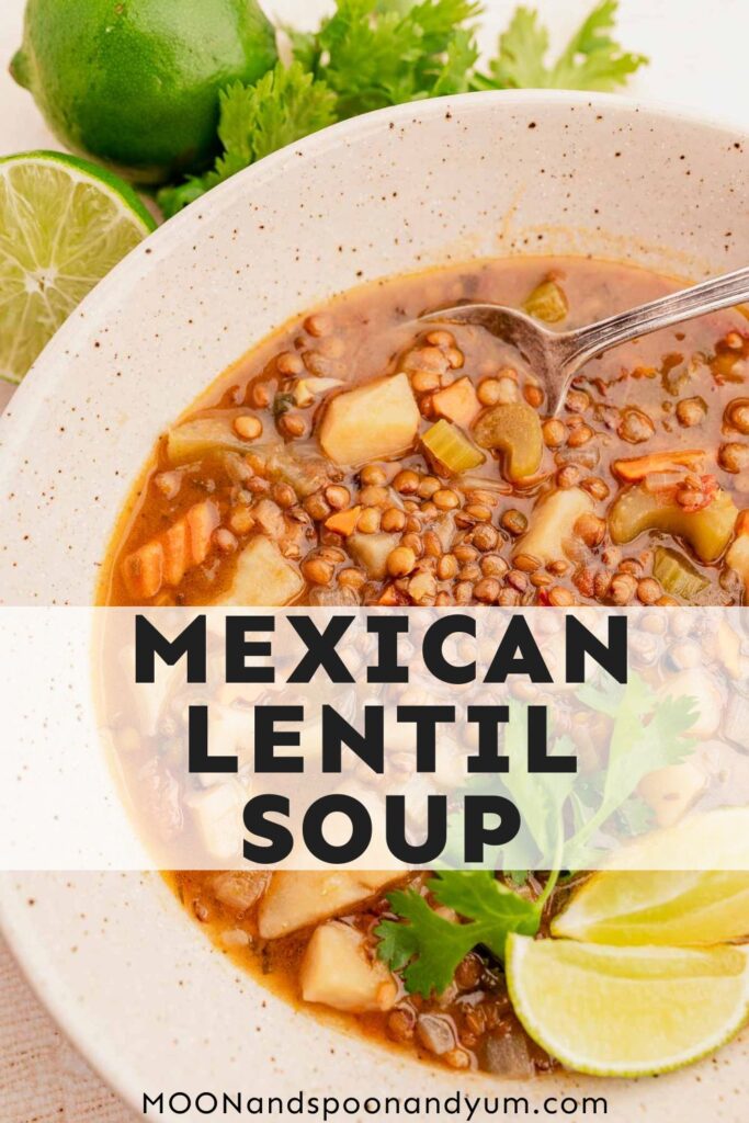 A bowl of Mexican lentil soup garnished with lime slices and cilantro, placed on a white background. Text overlay: "Mexican Lentil Soup.