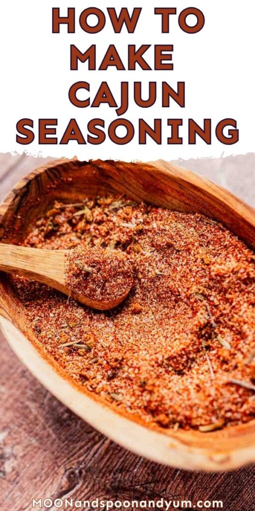 Wooden bowl with Cajun seasoning and a wooden spoon, recipe title "How to Make Cajun Seasoning" at the top.