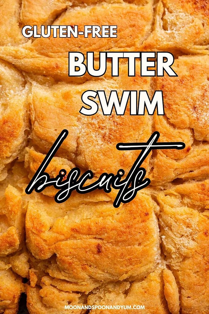 Close-up of golden, flaky gluten free butter swim biscuits with text overlay highlighting this easy, delicious recipe.